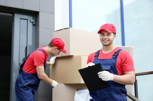 Packed office furniture and equipment ready for relocation