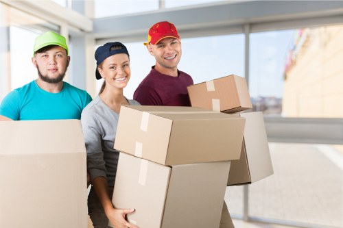 Removal van and moving boxes for a house move in Bow