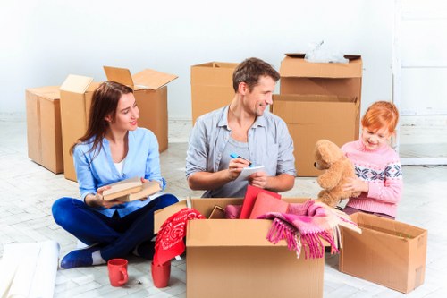 Local moving van helping with furniture transport in Bow