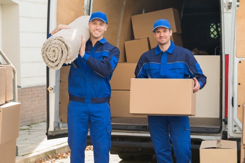 Removal team preparing a home move in Bow
