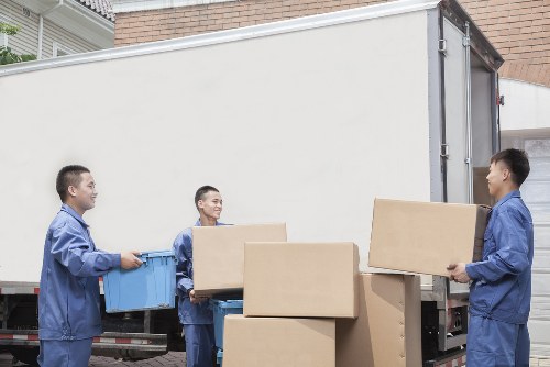 A professional moving team handling careful packing and transport