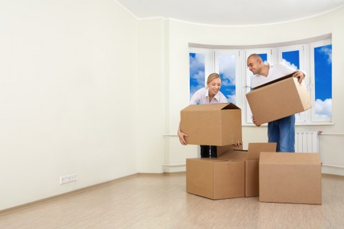Local removal team planning a move in Bow with packing materials