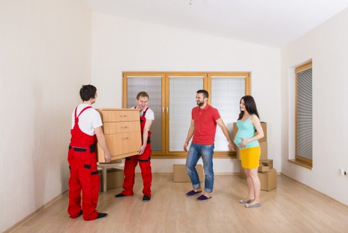 Unpacking assistance helping a customer settle into a Bow property