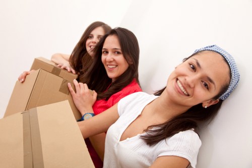 Packed household items ready for collection by a Bow removal company