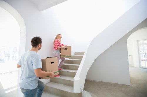 Moving boxes and furniture loaded for transport in East London