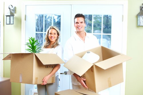 Moving team loading household items in East London