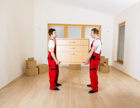 Careful loading of office items for a Bow business move